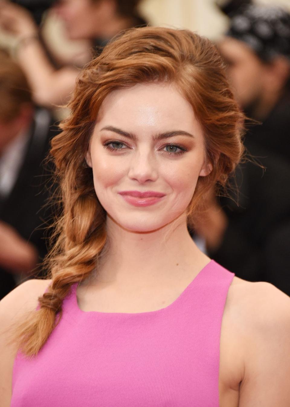 <p>Not a perfectionist? This is the braid for you. Stone's stylist <a rel="nofollow noopener" href="https://fashionista.com/2014/05/emma-stone-met-gala-braid" target="_blank" data-ylk="slk:Mara Roszak;elm:context_link;itc:0;sec:content-canvas" class="link ">Mara Roszak</a> said this look from the Met Ball was all about texture. Try Sexy Hair Root Pump Volumizing Spray Mousse ($19, <a rel="nofollow noopener" href="https://www.ulta.com/big-sexy-hair-root-pump-plus-humidity-resistant-volumizing-spray-mousse?productId=xlsImpprod4270021" target="_blank" data-ylk="slk:ulta.com;elm:context_link;itc:0;sec:content-canvas" class="link ">ulta.com</a>) for a similar effect. </p>