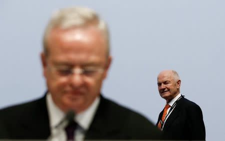 Ferdinand Piech (R), chairman of the supervisory board of German carmaker Volkswagen walks beside President and CEO of Porsche Automobil Holding SE Martin Winterkorn as they attend the annual shareholders meeting of Porsche in Leipzig, April 30, 2013. REUTERS/Fabrizio Bensch