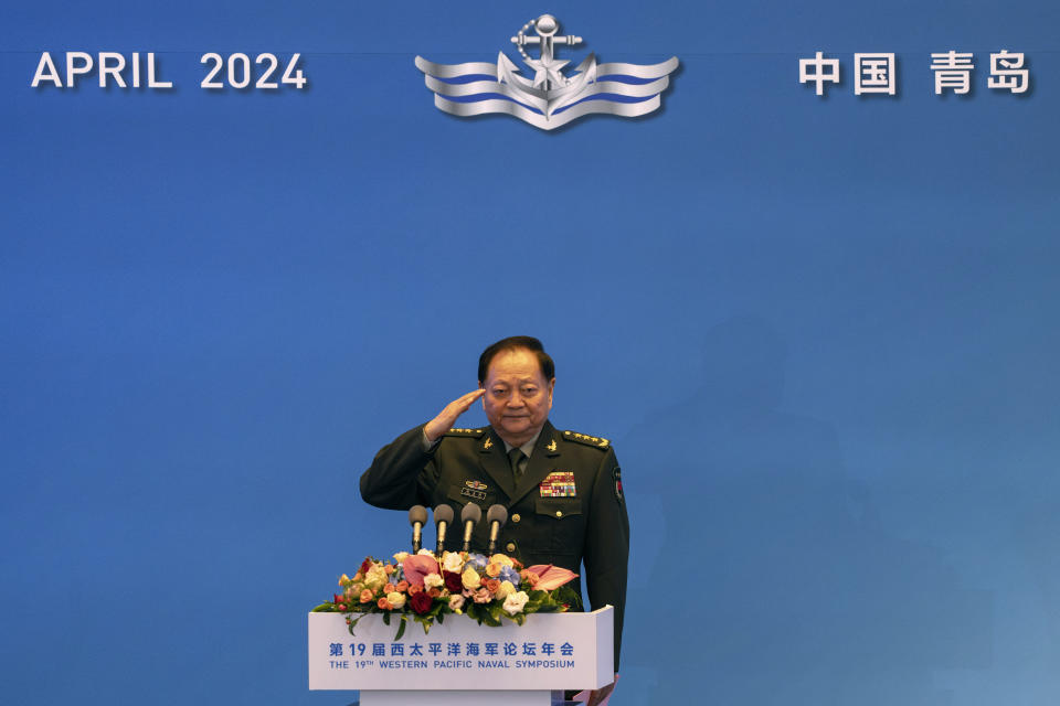 Zhang Youxia, Vice Chairman of the CPC Central Military Commission, salutes after addressing the Western Pacific Navy Symposium in Qingdao in eastern China's Shandong province on Monday, April 22, 2024. Zhang, China's second-ranking military leader under Xi Jinping, said China committed to solve maritime disputes through dialogue but warned that International law could not be distorted.(AP Photo/Ng Han Guan)