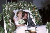 FILE PHOTO - Prince Nikolaos, son of Greece's deposed King Constantine, and his bride Tatiana Blatnik leave Agios Nikolaos church after their wedding ceremony on the Greek island of Spetses August 25, 2010. REUTERS/John Kolesidis