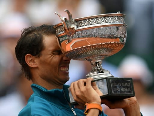 Hello again: Rafael Nadal holds La Coupe des Mousquetaires for the 11th time