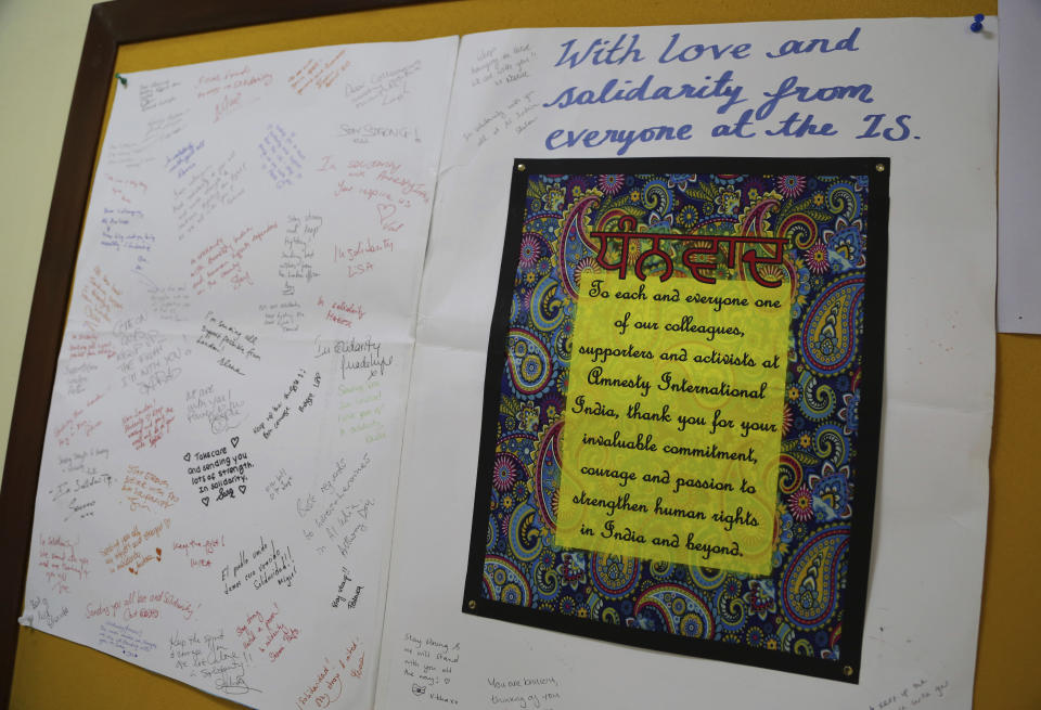Messages of solidarity written by Amnesty International London employees are displayed at Amnesty International India headquarters in Bangalore, India, Tuesday, Feb. 5, 2019. International rights groups and foreign aid organizations with deep roots in India say they are struggling to operate under the administration of Prime Minister Narendra Modi, whose Hindu nationalist Bharatiya Janata Party has elevated the role of homegrown social groups while cracking down on foreign charities. (AP Photo/Aijaz Rahi)