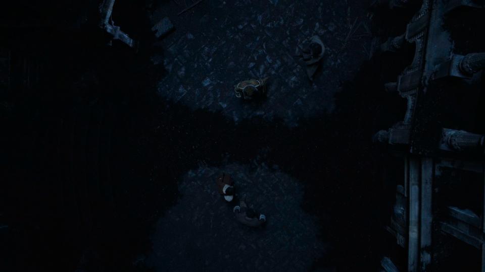 Overhead shot of a cobbled street in Shadar Logoth, with Mashadar, a creeping, black, ink-like substance cutting off our heroes from one another – Mat and Rand on one side, Perrin and Egwene on the other