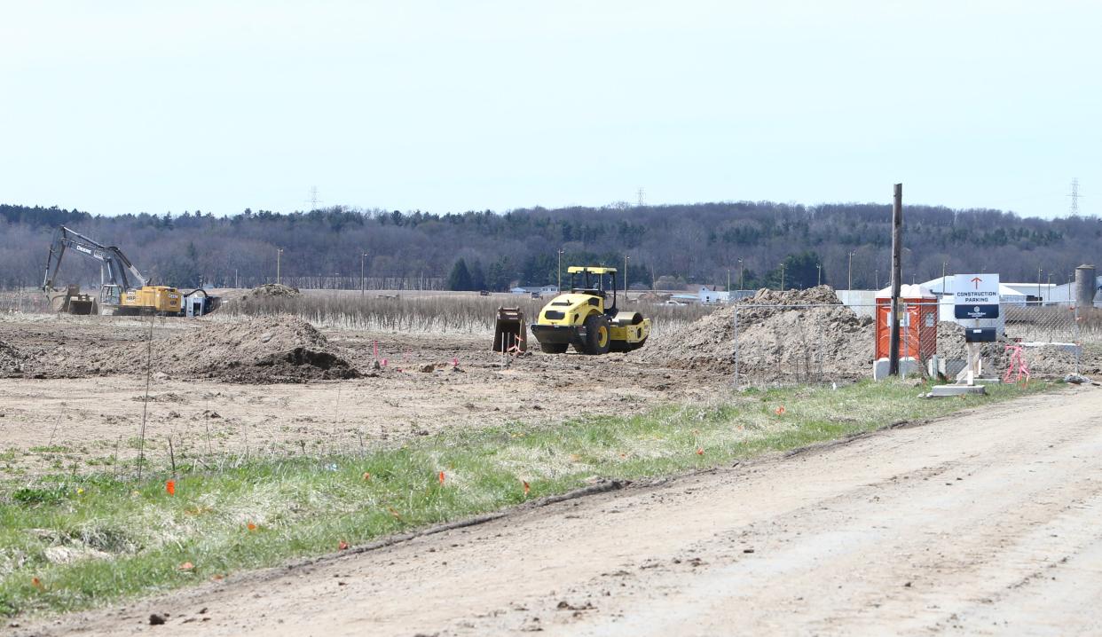 Crews perform excavation work Tuesday, April 9, 2024, on Fillmore Road west of Larrison Boulevard near New Carlisle.