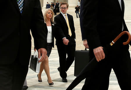 Maureen McDonnell (L) departs after her husband, former Virginia Governor Bob McDonnell's (not pictured) appeal of his 2014 corruption conviction was heard at the U.S. Supreme Court in Washington, U.S. April 27, 2016. REUTERS/Jonathan Ernst