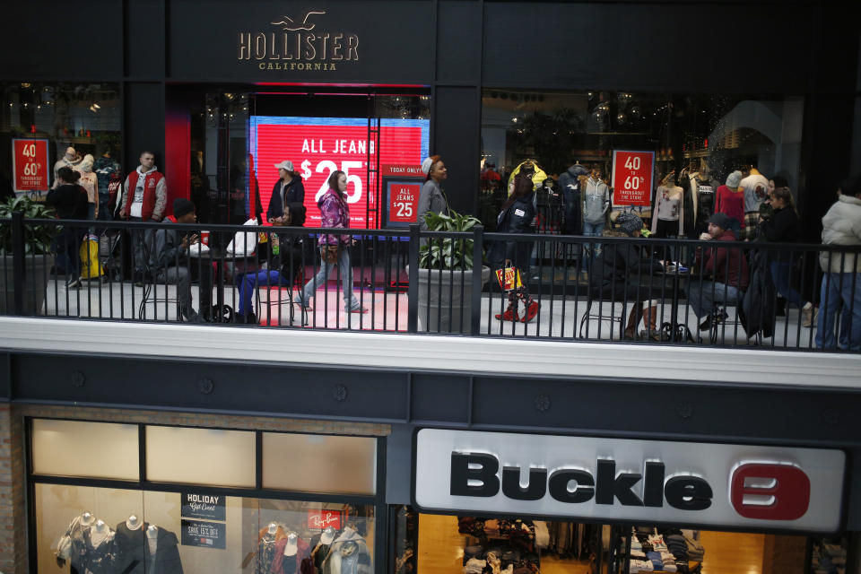 Shoppers was past a Hollister Co. store at the Easton Town Center Mall in Columbus, Ohio, U.S., on Tuesday, Dec. 26, 2017. Americans displayed their buying bona fides in the final run-up to Christmas, turning out in force to produce what may be the best holiday shopping season in years. Photographer: Luke Sharrett/Bloomberg via Getty Images