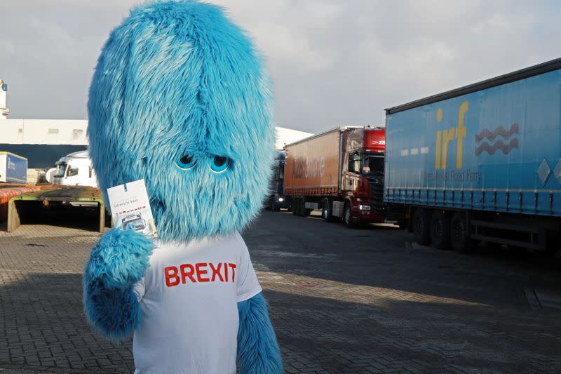A blue furry monster known as the 'Brexit Monster' makes an appearance in the port of Rotterdam