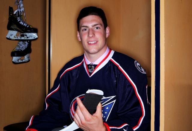 Pierre-Luc Dubois poses for a photo after being selected third overall by the Columbus Blue Jackets in round one, during the 2016 NHL Draft, in Buffalo, New York, on June 24 (AFP Photo/Jeffrey T. Barnes)