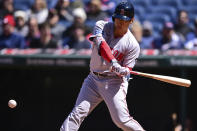 Boston Red Sox's Masataka Yoshida swings during the fifth inning of a baseball game against the Cleveland Guardians, Thursday, April 25, 2024, in Cleveland. (AP Photo/David Dermer)