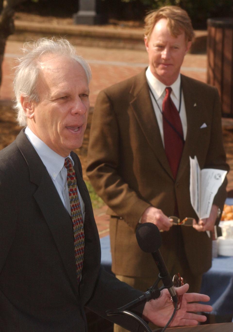 Then-Maryland state Sen. Paul Pinsky from Prince George's County, left, with Will Baker, then-president of the Chesapeake Bay Foundation, speaks in this 2004 file phot during a press conference outside the Capitol in Annapolis.