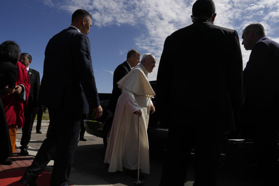 Pope Francis leaves at the end of a meeting with religious leaders at the Hun Theatre some 15 kilometers south of the Mongolian capital Ulaanbaatar, Sunday, Sept. 3, 2023. Pope Francis has praised Mongolia's tradition of religious freedom dating to the times of founder Genghis Khan during the first-ever papal visit to the Asian nation. (AP Photo/Ng Han Guan)