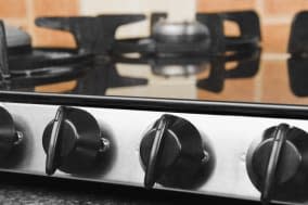 gas stove on a kitchen counter