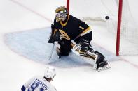 Tampa Bay Lightning's Steven Stamkos (91) scores on Boston Bruins' Jeremy Swayman (1) in overtime during an NHL hockey game, Saturday, Dec. 4, 2021, in Boston. (AP Photo/Michael Dwyer)