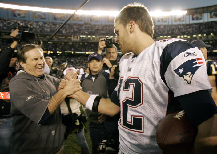 New England Patriots coach Bill Belichick (L) congratulates Patriots quarterback Tom Brady after the Patriots defeated the San Diego Chargers during  their AFC Divisional NFL playoff football game in San Diego, January 14, 2007. REUTERS/Robert Galbraith (UNITED STATES)