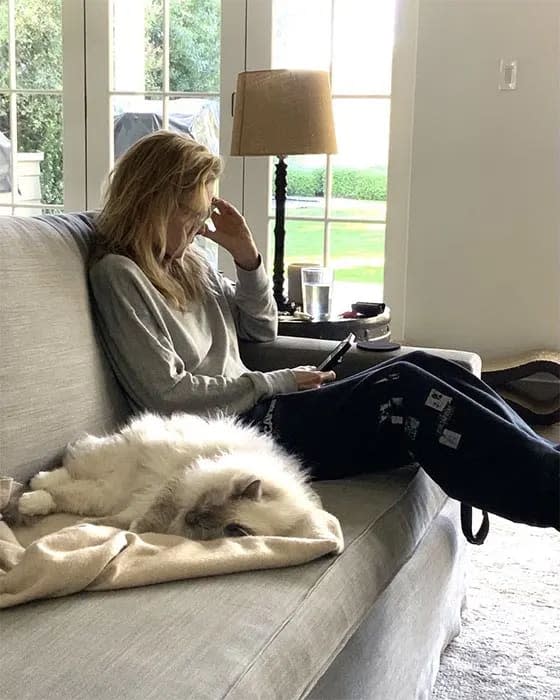 michelle on sofa with cat