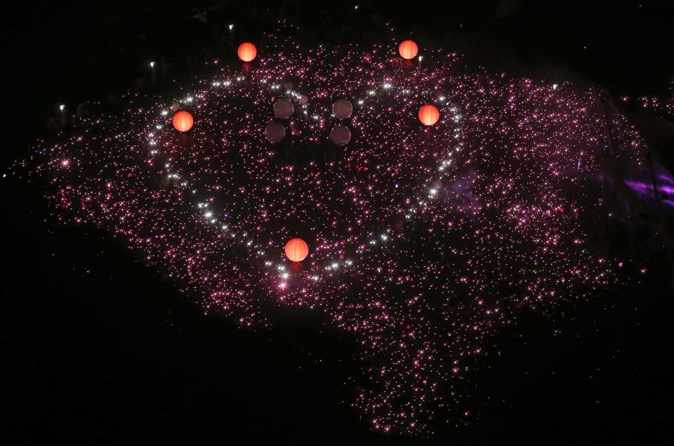 Participants form a giant pink dot at the Speakers' Corner in Hong Lim Park in Singapore June 28, 2014. The annual Pink Dot Sg event promotes an acceptance of the Lesbian, Gay, Bisexual and Transgender (LGBT) community in Singapore, according to organizers. REUTERS/Edgar Su (SINGAPORE - Tags: SOCIETY)