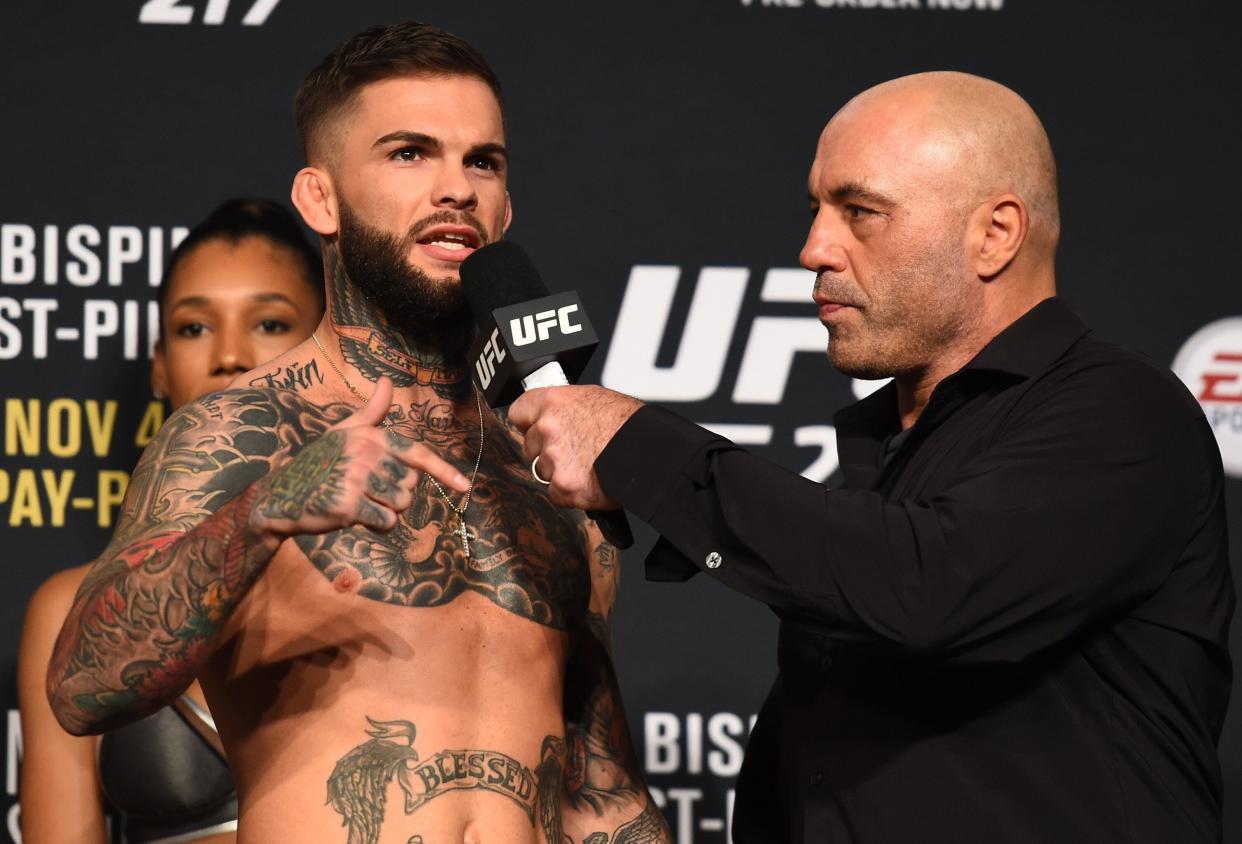 Rogan, who has also done UFC commentating, interviews Cody Garbrandt Madison Square Garden in 2017. (Photo: Josh Hedges via Getty Images)