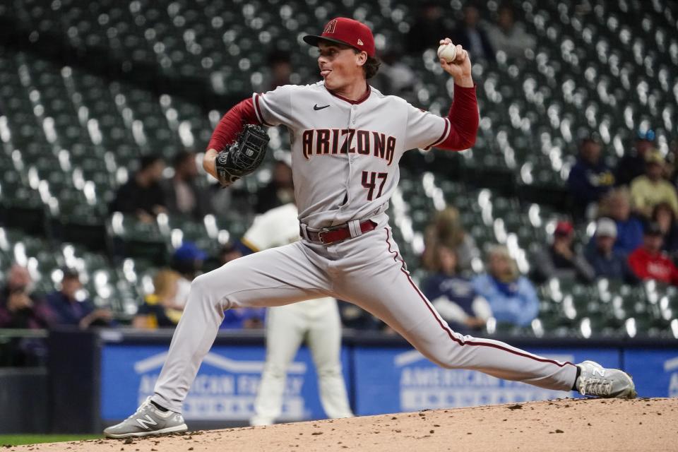 Arizona Diamondbacks starting pitcher Tommy Henry throws during the first inning of a baseball game against the Milwaukee Brewers Monday, Oct. 3, 2022, in Milwaukee. (AP Photo/Morry Gash)