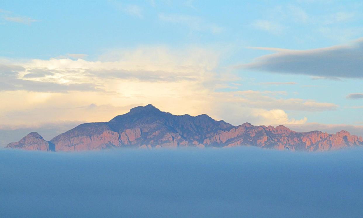 <span>The Portal peak in the Chiricahua mountains, one of the Sky Islands in south-east Arizona.</span><span>Photograph: BAlvarius</span>