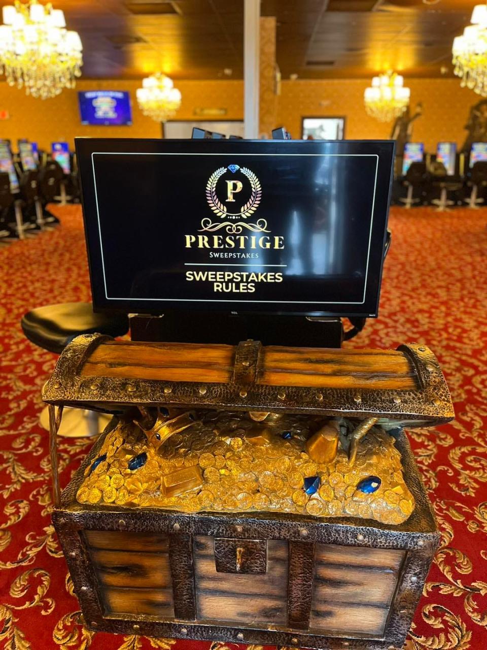 Prestige Sweepstakes, an adult arcade midway between Fort Pierce and Port St. Lucie in the 4400 block of U.S. 1 off Tumblin King Road in St. Lucie County, was raided by sheriff's deputies and state gaming agents Thursday, January 18, 2024. After a search by state and local law enforcement, three people, including the owner, were arrested and over $18,000 and slot machines were seized, according to the St. Lucie County Sheriff's Office.