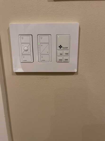 Wall-mounted bathroom fan and light switches with adjustable timer setting