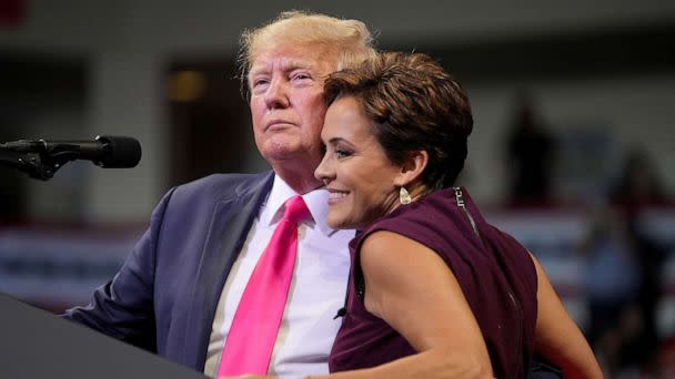 PHOTO: Former President Donald Trump hugs Kari Lake, candidate for Arizona governor, during a Save America rally in Prescott Valley, Ariz., July 22, 2022. (Antranik Tavitian/The Republic via USA Today Network)