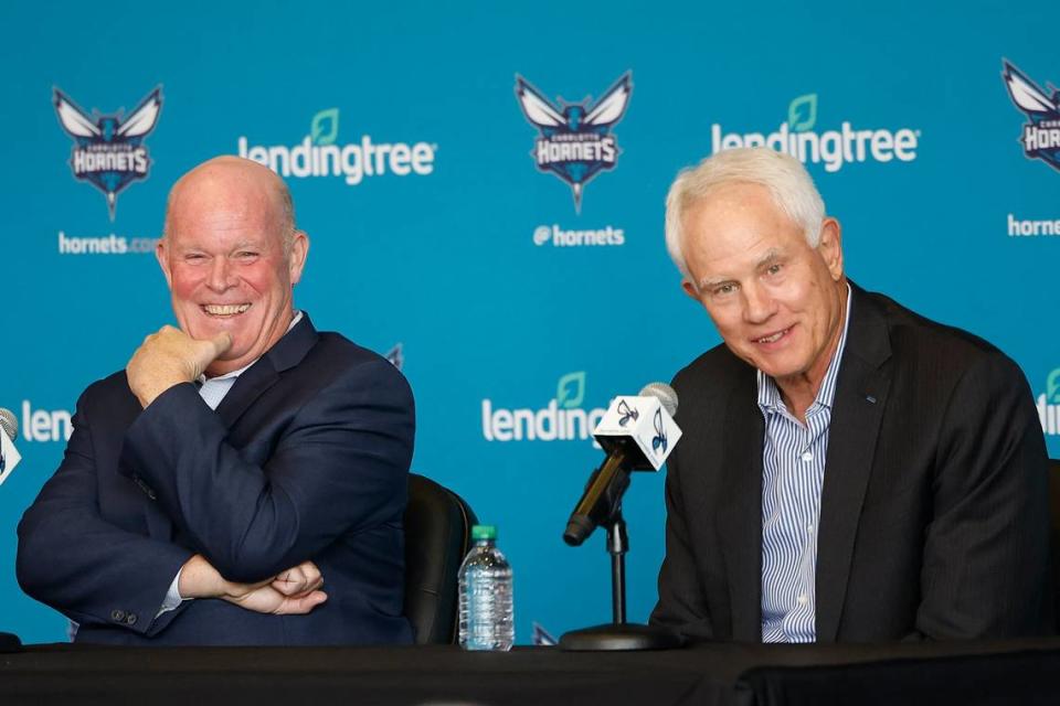 New Charlotte Hornets head coach Steve Clifford, left, and Charlotte Hornets general manager Mitch Kupchak react to a question during media conference at Spectrum Center in Charlotte, N.C., Tuesday, June 28, 2022.