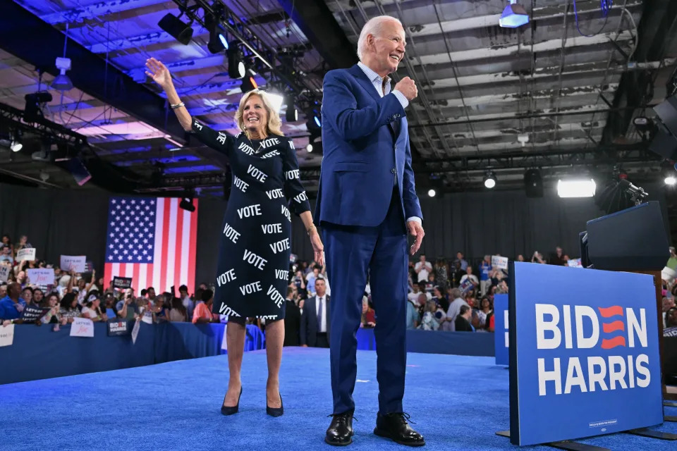 President Joe Biden and First Lady Jill Biden walk off the stage after a campaign event in Raleigh, North Carolina, on June 28, 2024.