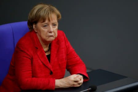 German Chancellor Angela Merkel attends a session of the Bundestag in Berlin.

 REUTERS/Axel Schmidt