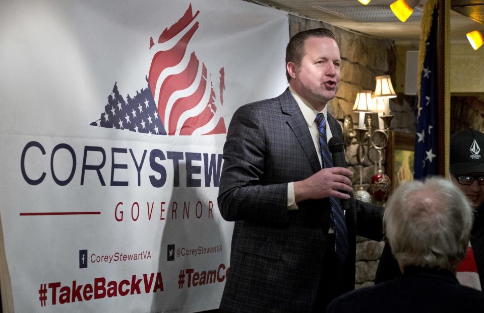 FILE - In this Monday, Jan. 23, 2017 file photo, Republican candidate for governor of Virginia, Corey Stewart, speaks at a campaign kickoff rally in a restaurant in Occoquan, Va. Stewart, a tough-talking former Donald Trump campaign chairman who says the president’s victory has freed candidates to "simply be yourself." (AP Photo/Steve Helber, File)