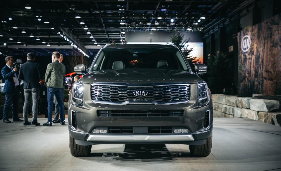 <p>Kia already has a sizable three-row crossover geared toward American families-it's called <a rel="nofollow noopener" href="https://www.caranddriver.com/kia/sorento" target="_blank" data-ylk="slk:the Sorento;elm:context_link;itc:0;sec:content-canvas" class="link ">the Sorento</a>-but these days, an automaker can never have too many SUVs. Enter <a rel="nofollow noopener" href="https://www.caranddriver.com/news/a23031449/2020-kia-telluride-three-row-suv-photos-info/" target="_blank" data-ylk="slk:the all-new, even bigger three-row Telluride;elm:context_link;itc:0;sec:content-canvas" class="link ">the all-new, even bigger three-row Telluride</a>, which towers over the Sorento it joins in Kia's lineup. It's bolder, brasher, and more American-looking than anything Kia has ever made (the <a rel="nofollow noopener" href="https://www.caranddriver.com/reviews/a15147941/2009-kia-borrego-ex-short-take-road-test/" target="_blank" data-ylk="slk:body-on-frame Borrego SUV;elm:context_link;itc:0;sec:content-canvas" class="link ">body-on-frame Borrego SUV</a> included), and it debuted, fittingly, at <a rel="nofollow noopener" href="https://www.caranddriver.com/auto-shows/detroit-auto-show-news-reveals" target="_blank" data-ylk="slk:the 2019 Detroit auto show;elm:context_link;itc:0;sec:content-canvas" class="link ">the 2019 Detroit auto show</a> right in the American Big Three's back yard. At first blush, <a rel="nofollow noopener" href="https://www.caranddriver.com/kia/telluride" target="_blank" data-ylk="slk:the Telluride;elm:context_link;itc:0;sec:content-canvas" class="link ">the Telluride</a>'s look might look vaguely familiar (we initially likened it loosely to GMC's Yukon), but we had Kia's chief U.S. designer Tom Kearns walk us through the SUV's "clean, pure, minimalistic" style and the flourishes that help it stand apart. The man has led Kia's Irvine, California, design studio for 14 years-that's longer than half of Kia's existence in the American market-and is a big contributor to the brand's shedding of its bargain-basement image. </p>