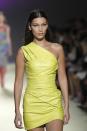 Model Bella Hadid wears a creation as part of Versace's women's 2019 Spring-Summer collection, unveiled during the Fashion Week in Milan, Italy, Friday, Sept. 21, 2018. (AP Photo/Antonio Calanni)