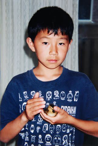 <p>Simu Liu X</p> Simu Liu as a child.