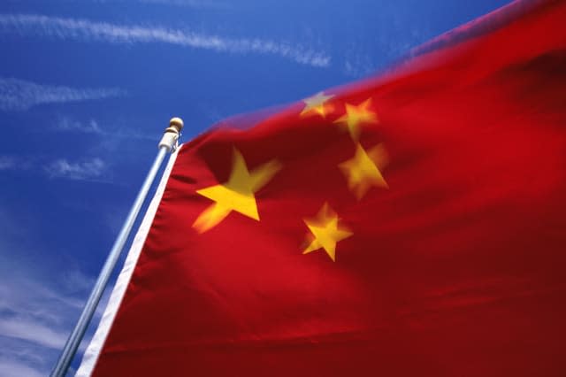 Flag of ChinaBlue Clear Sky Day  Outdoors Rectangle Rippled Flag Wind Identity Patriotism Culture Close-up Color Image Nobod