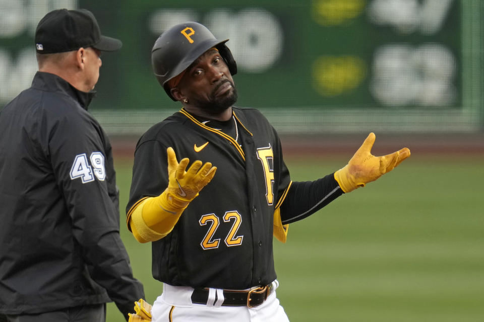 Pittsburgh Pirates' Andrew McCutchen (22) gestures as he stands on second base with a double off Chicago White Sox starting pitcher Mike Clevinger (not shown) during the first inning of a baseball game in Pittsburgh, Saturday, April 8, 2023. (AP Photo/Gene J. Puskar)