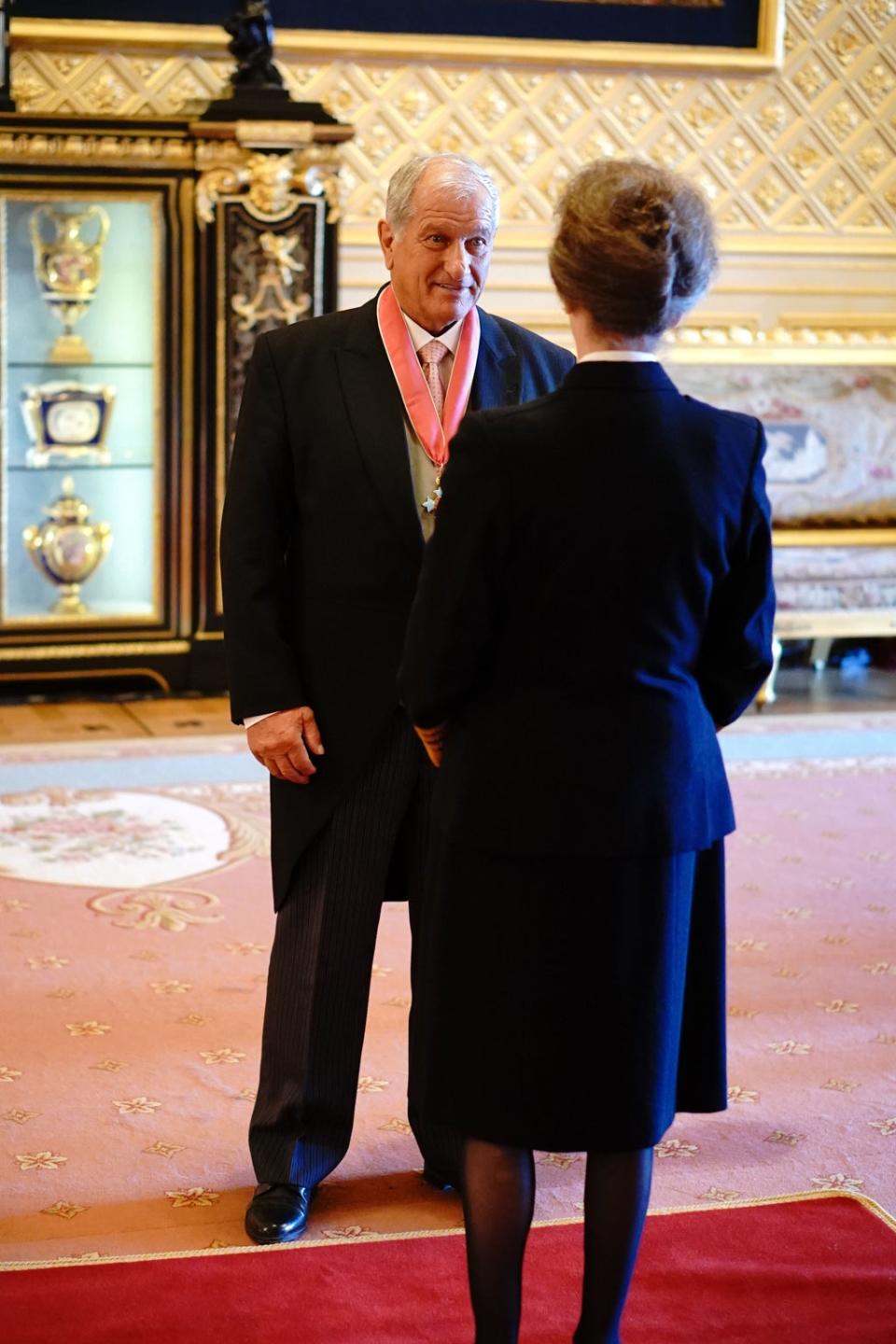 Bob Champion is made a CBE by the Princess Royal at Windsor Castle (Jonathan Brady/PA) (PA Wire)