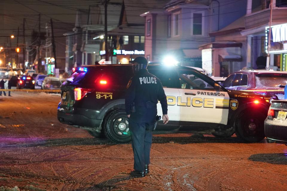 Police at the scene of a fatal shooting in Paterson's 6th Ward on Thursday, Feb. 18, 2021.