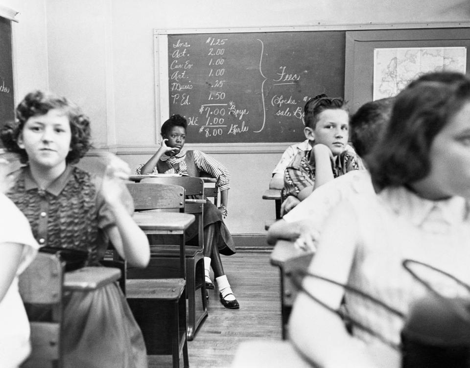 An African-American girl sits in the back row of a classroom in a Charlotte, N.C., school as integration got underway on Sept. 7, 1957. Three local schools were integrated in the city with only one minor disturbance. (Photo: Bettmann/Getty Images)