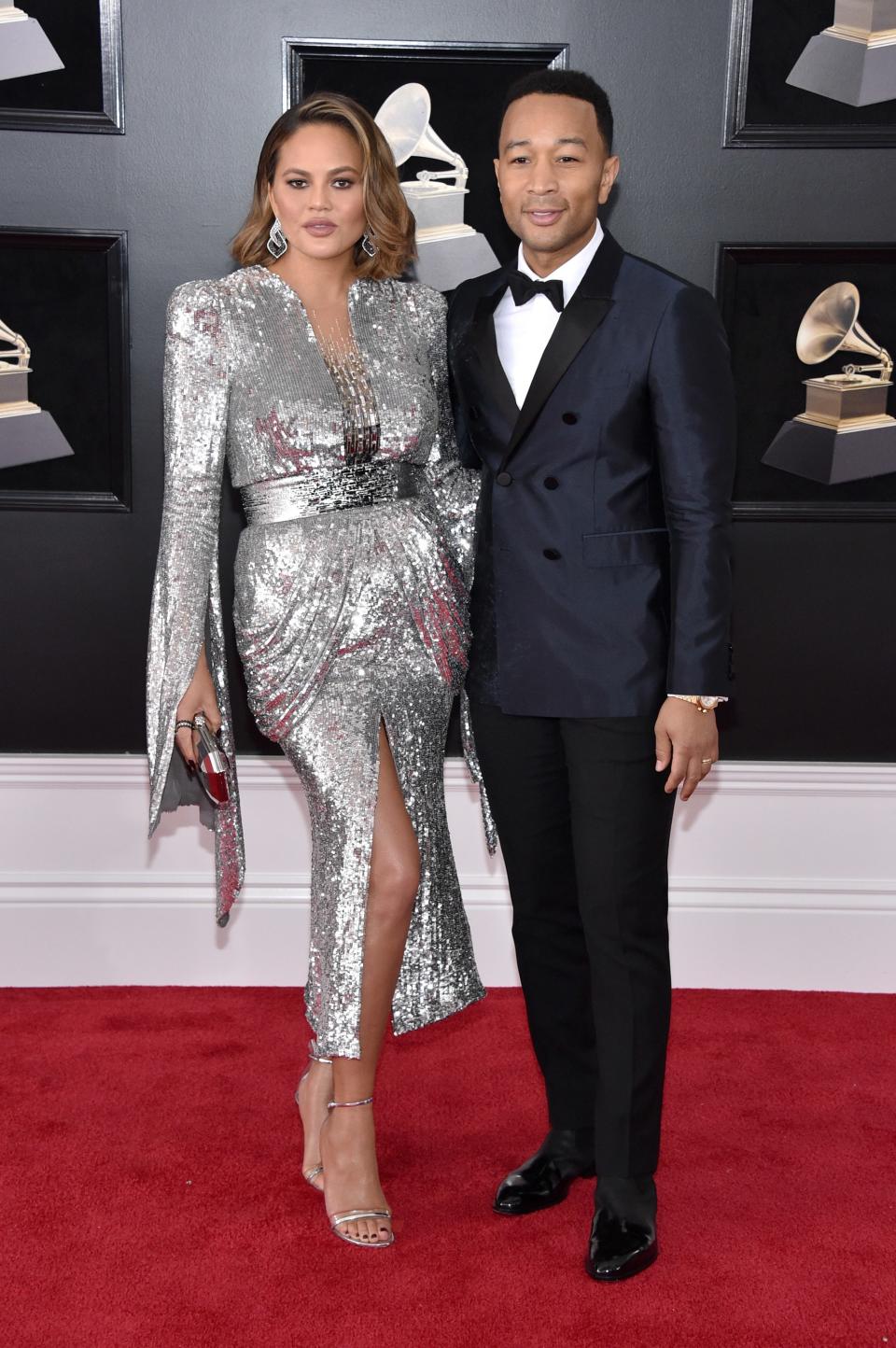 John Legend in Burberry with Chopard cuff links and Bruno Magli boots