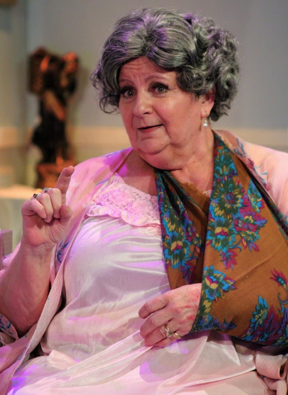 Pam Peraza portrays a woman in her 90s who tells stories about the ups and down in her life in this rehearsal scene from "Three Tall Women," Abilene Community Theatre's season-ending drama.