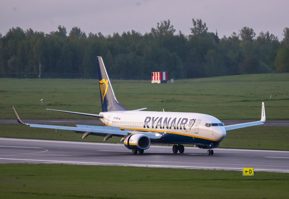 FILE - In this May 23, 2021, file photo, a Ryanair jet that carried opposition figure Raman Pratasevich was diverted to Minsk, Belarus, after a bomb threat. Pratasevich, who ran a channel on a messaging app used to organize demonstrations against authoritarian President Alexander Lukashenko, was arrested after the plane landed. He had left his homeland in 2019 to try to escape the reach of the Belarusian KGB, but now faces 15 years in prison on a charge of inciting disturbances. (AP Photo/Mindaugas Kulbis, File)