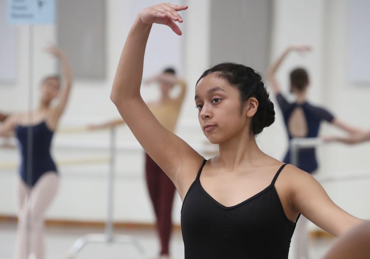 Wendy Moreno-Garcia participates in a class at Nan Klinger Excellence in Dance in Cuyahoga Falls on Thursday.