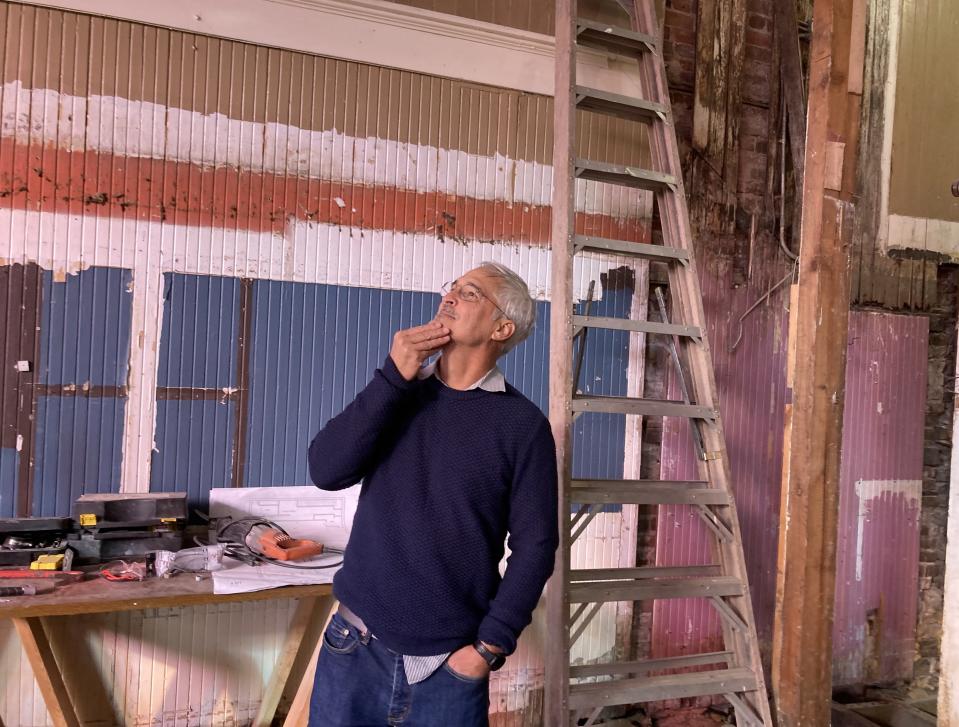 Chris Yermal, with Old School Rebuilders, looks over one of his current projects in the former Platypus & Gnome and Caffe Phoenix restaurant location at 35 N. Front. St. in downtown Wilmington, N.C.