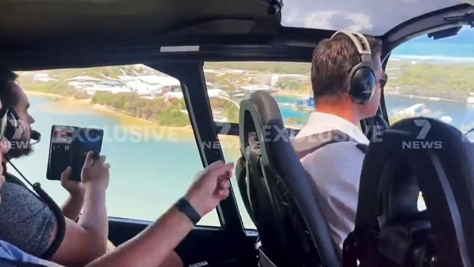 Video image from 7News of pilot Michael James flying a helicopter moments before the two Sea World Helicopters collide over the Broadwater, Gold Coast.