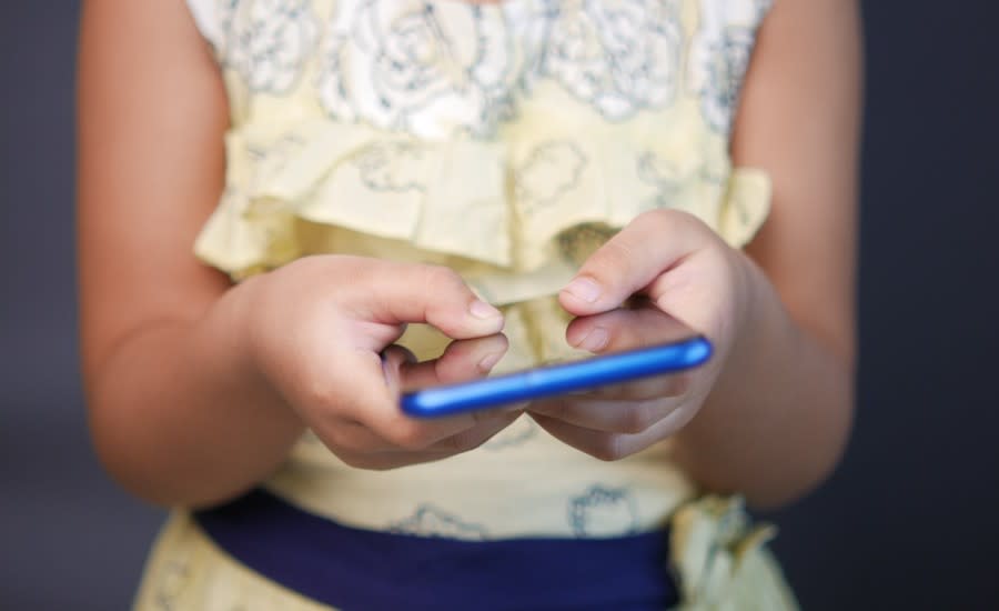 Child on smartphone.