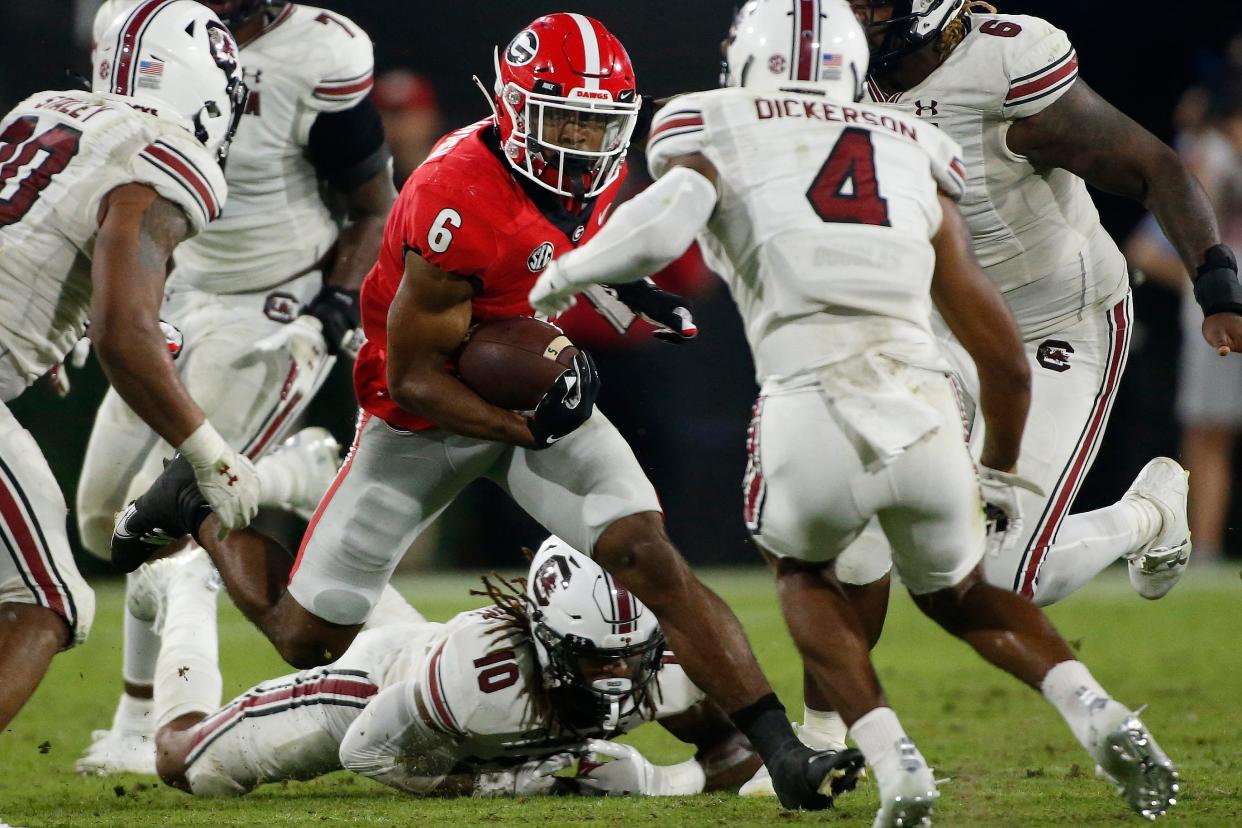 Sep 18, 2021; Athens, Georgia, USA; Georgia running back Kenny McIntosh (6) moves the ball down the field during the second half of an NCAA college football game between South Carolina and Georgia at Sanford Stadium. Mandatory Credit: Joshua L. Jones/Athens Banner-Herald via USA TODAY NETWORK