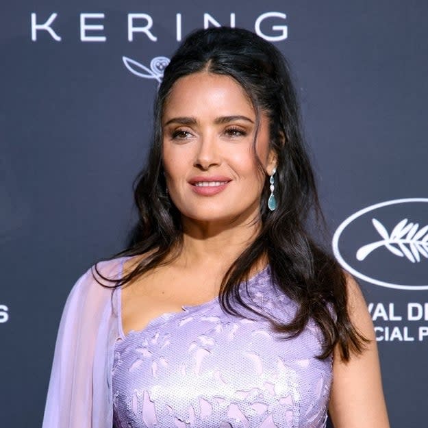 Salma Hayek in an elegant one-shoulder gown at a formal event