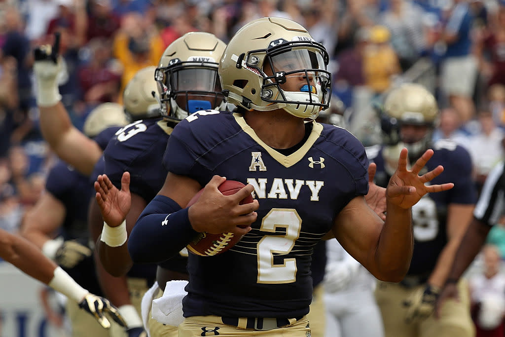 ANNAPOLIS, MD - SEPTEMBER 03: Quarterback Tago Smith #2 of the Navy Midshipmen celebrates after rushing for a first quarter touchdown against the Fordham Rams at Navy-Marine Corps Memorial Stadium on September 3, 2016 in Annapolis, Maryland. (Photo by Rob Carr/Getty Images)