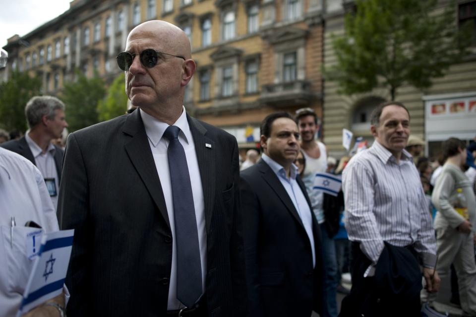 Israeli Ambassador to Hungary Ilan Mor, left, participates of the March of The Living to commemorate victims of the Holocaust in Budapest, Hungary, Sunday, April 27, 2014. It marks the 70th anniversary of the beginning of the Hungarian holocaust during which some 600 thousand Jewish Hungarians were deported to Nazi death camps. (AP Photo/MTI, Bea Kallos)