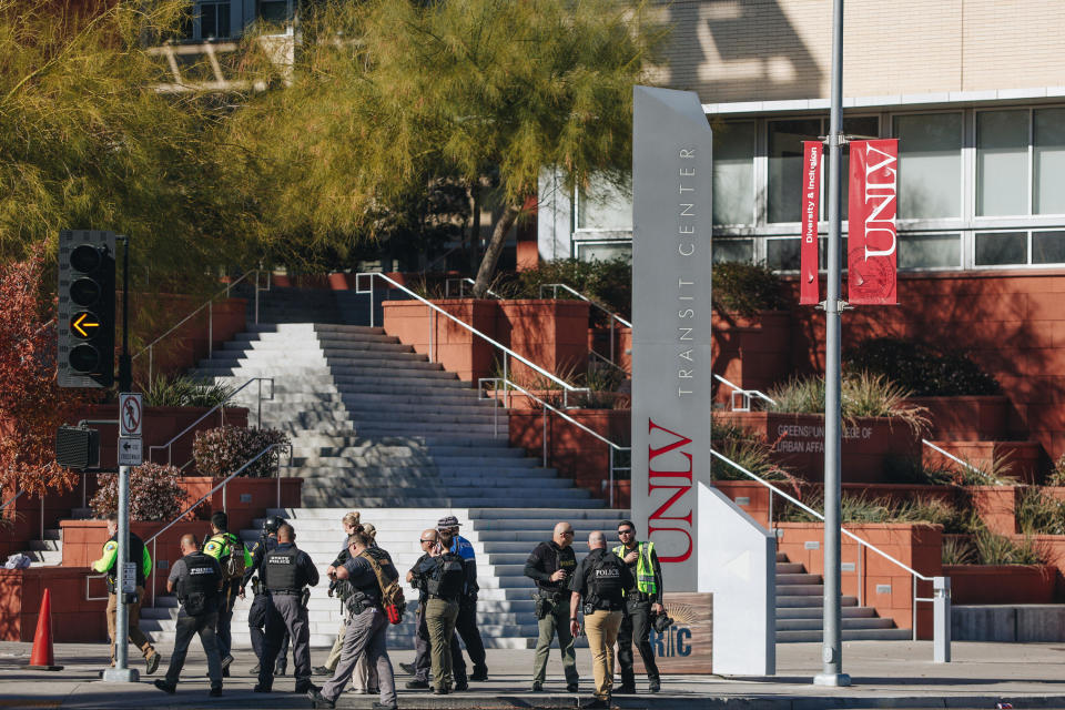Police are seen at the scene of a shooting on the UNLV campus on Wednesday, Dec. 6, 2023, in Las Vegas. / Credit: Madeline Carter/Las Vegas Review-Journal/Tribune News Service via Getty Images